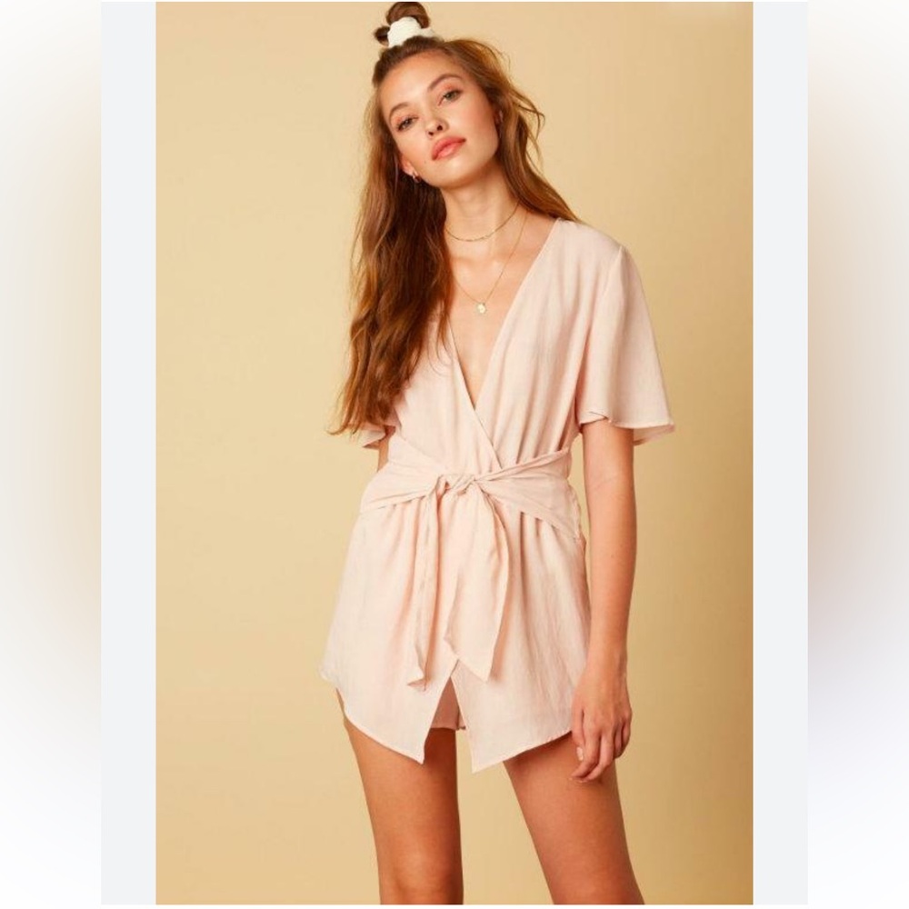 The impeccable pig Blush Tie Front Asymmetrical Romper. Size M